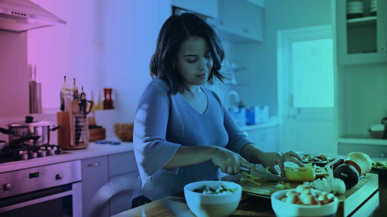 Woman preparing a well-balanced meal to help combat post-concussion fatigue